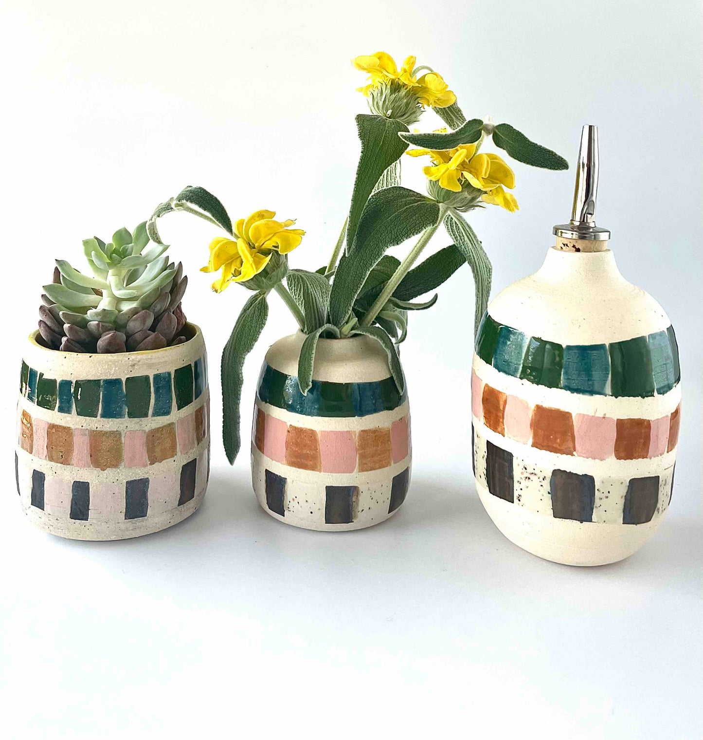 small stoneware vase in a trio with planter and cruet with multicolor handpainted detail by Hey Moon Ceramics