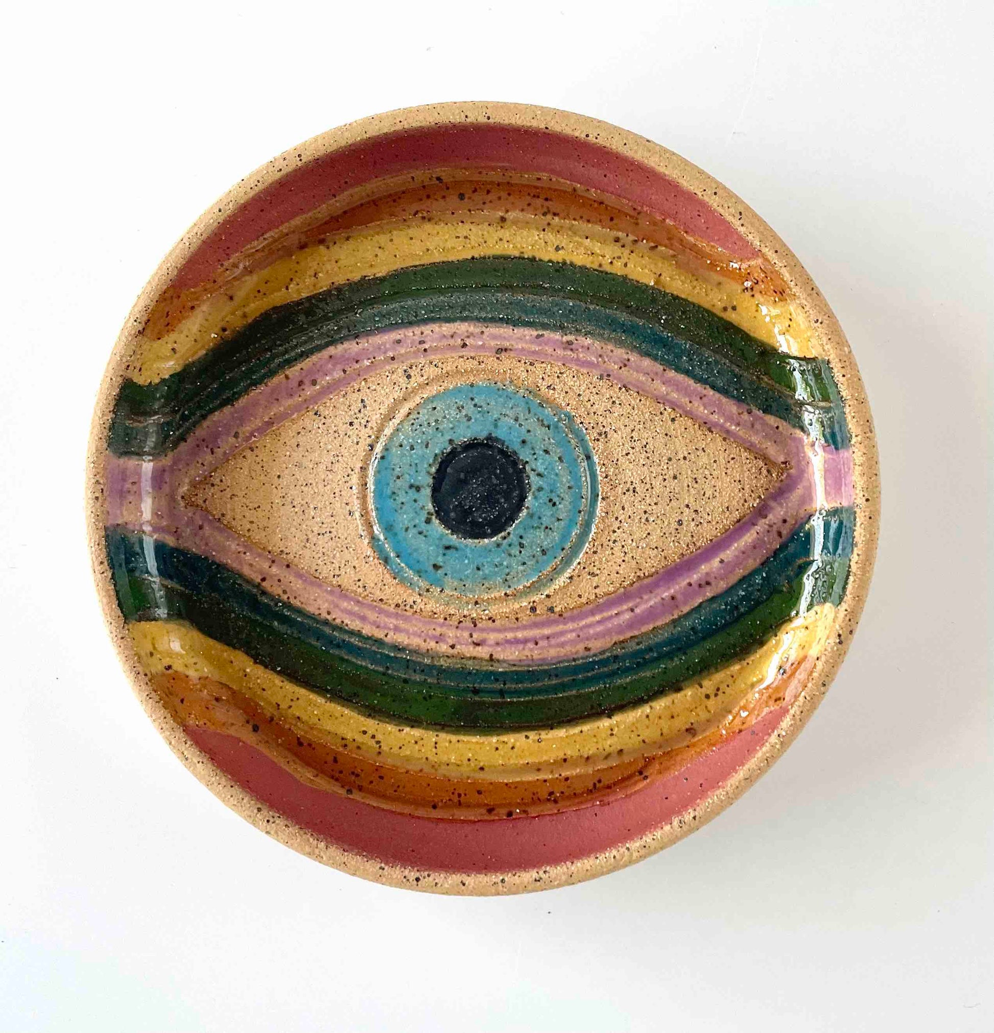 evil eye catch all with hand paitned rainbow detail by Hey Moon Ceramics