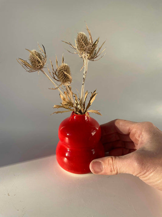 bud vase with horizontal ribbing in glossy red by hey moon ceramics