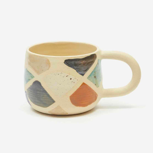 ceramic mug with multicolored glaze