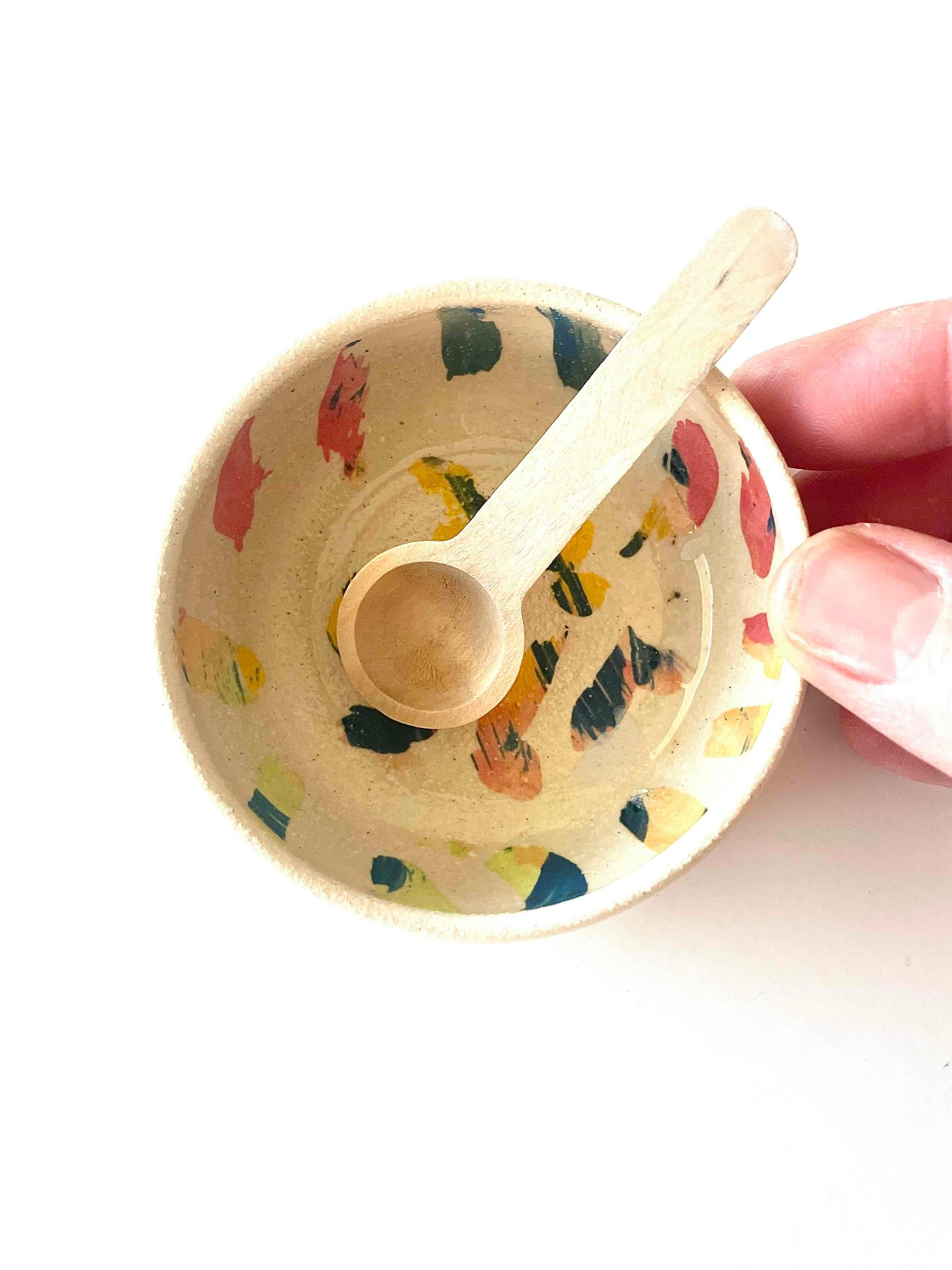 small white ceramic bowl with underglaze mullti color detail and wooden spoon - Hey Moon Ceramics