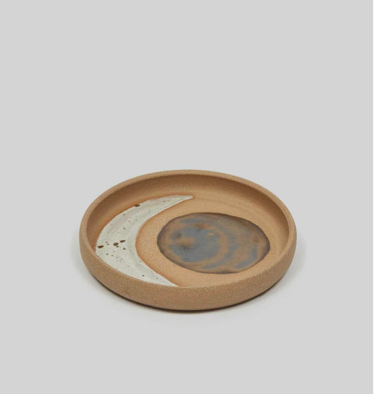 wheel thrown by hey moon ceramics. catch-all with hand painted crescent moon and bronze sun on tan stoneware